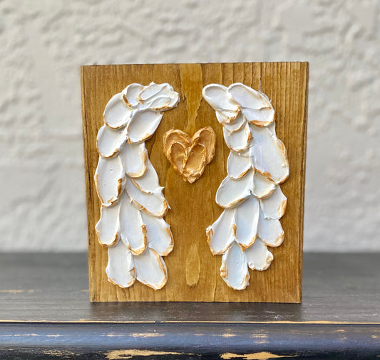 Angel wings with heart